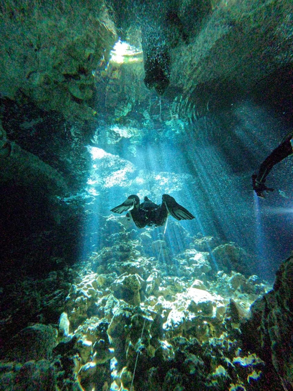 A shaft of light entering Taína cave